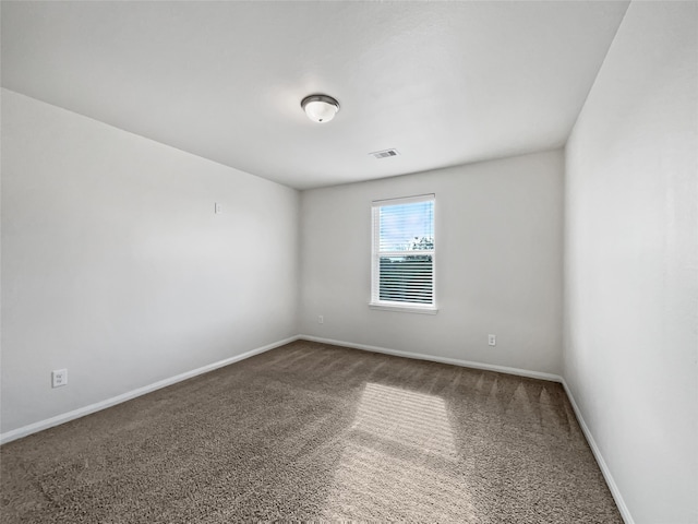 spare room with carpet flooring