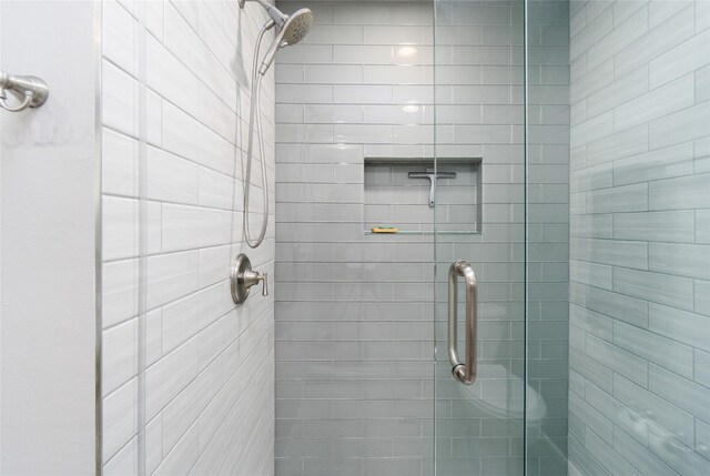 bathroom featuring walk in shower