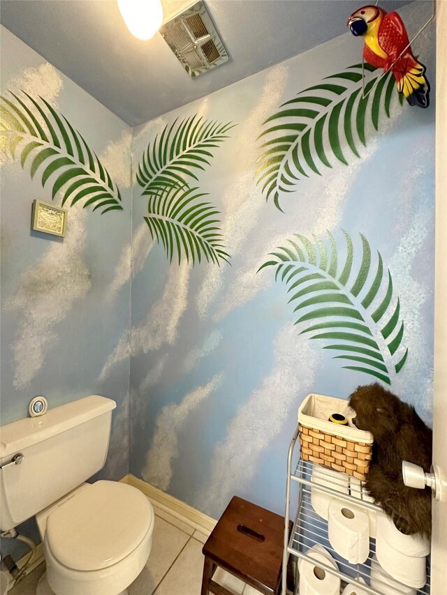 bathroom featuring toilet and tile patterned floors