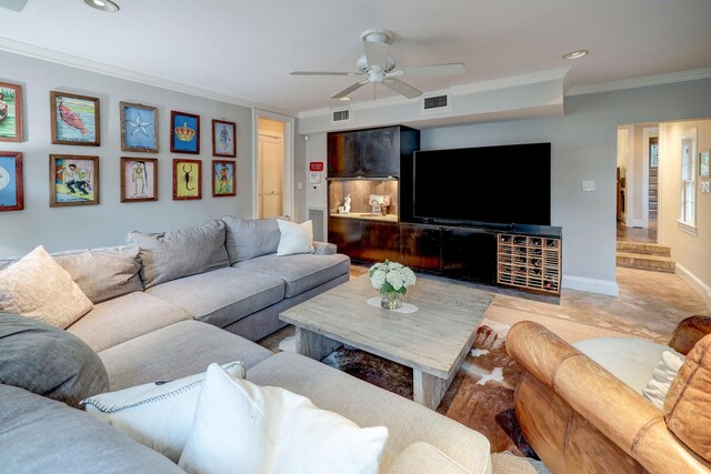 living room with crown molding and ceiling fan