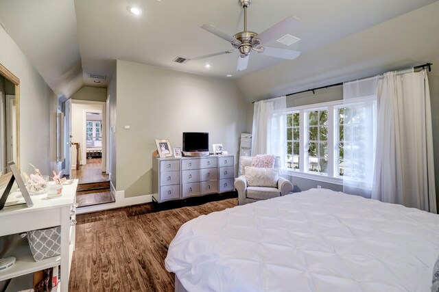 bedroom with multiple windows, lofted ceiling, dark hardwood / wood-style floors, and ceiling fan