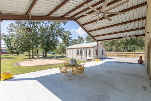 view of patio / terrace featuring an outdoor structure and ceiling fan