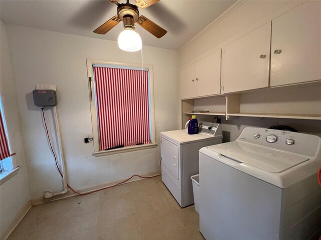 laundry room featuring washer and clothes dryer, ceiling fan, ornamental molding, and cabinets