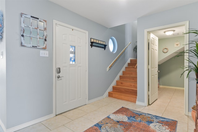 view of tiled foyer entrance