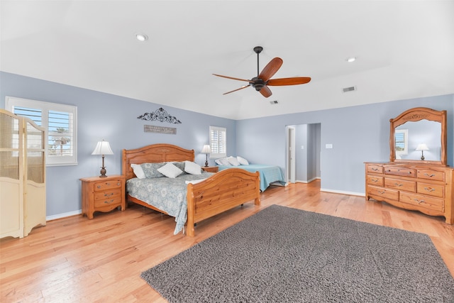 bedroom with light wood-type flooring and ceiling fan