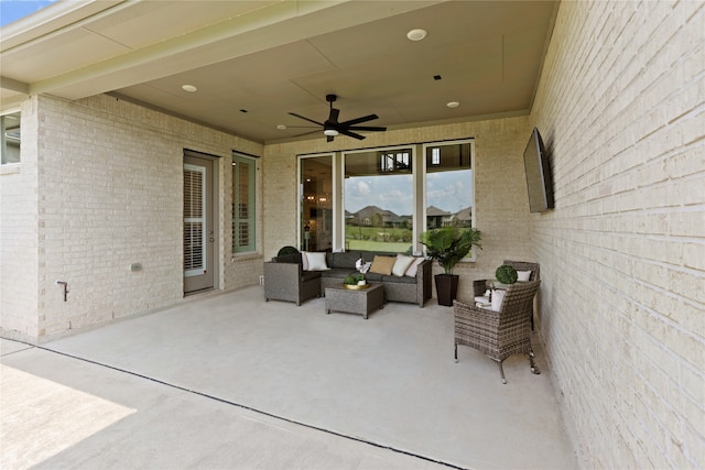 view of patio / terrace featuring ceiling fan and outdoor lounge area