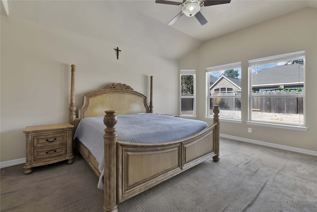 bedroom featuring ceiling fan, carpet flooring, and vaulted ceiling