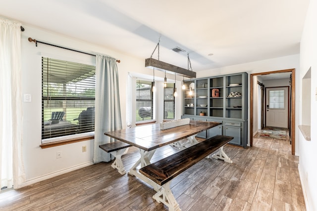 dining room featuring wood-type flooring