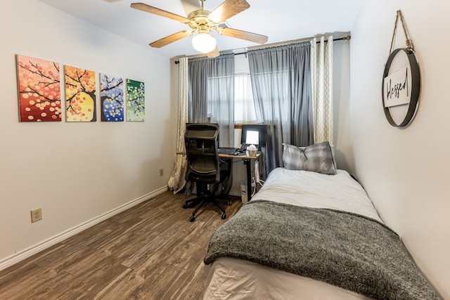 bedroom with ceiling fan and wood-type flooring