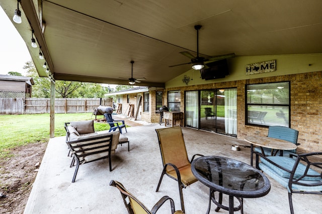 view of patio featuring an outdoor hangout area and ceiling fan