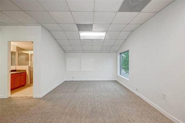 9788 Clarewood Dr Unit 201, Houston, TX 77036 - unfurnished room with light colored carpet, a paneled ceiling, and baseboards