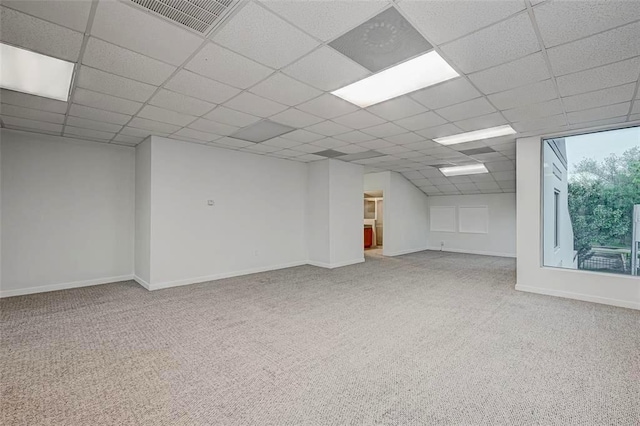 9788 Clarewood Dr Unit 201, Houston, TX 77036 - carpeted empty room with baseboards and a drop ceiling