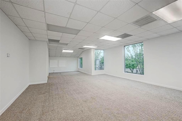 9788 Clarewood Dr Unit 201, Houston, TX 77036 - carpeted empty room with a drop ceiling and baseboards