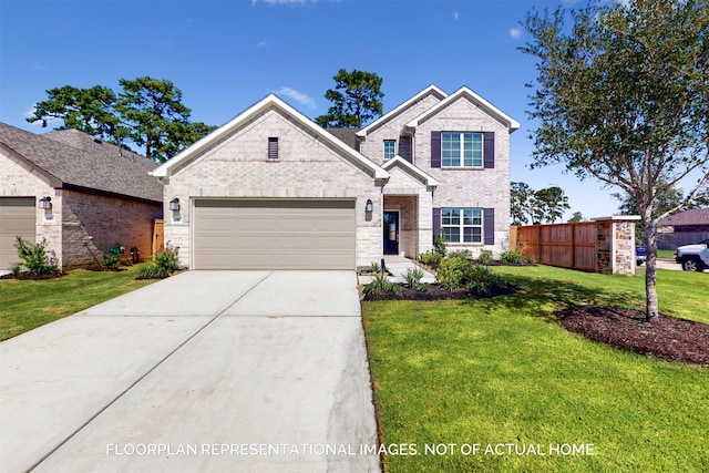 view of front of home featuring a garage and a front lawn