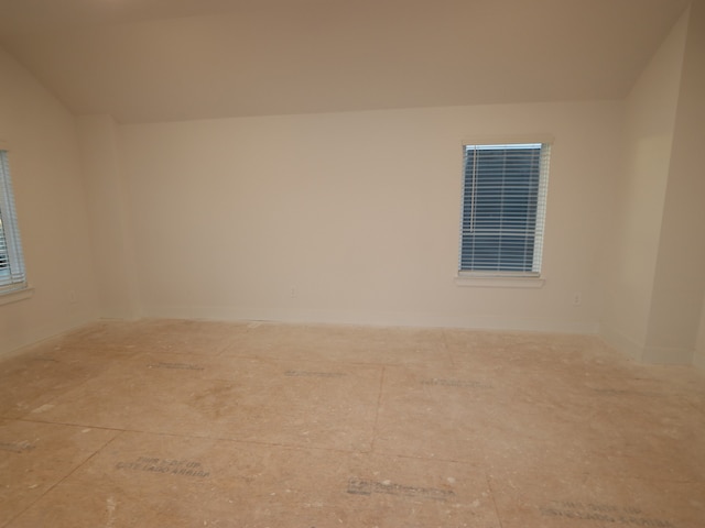 234 Augustine Way, Magnolia, TX 77354 - empty room with lofted ceiling and baseboards