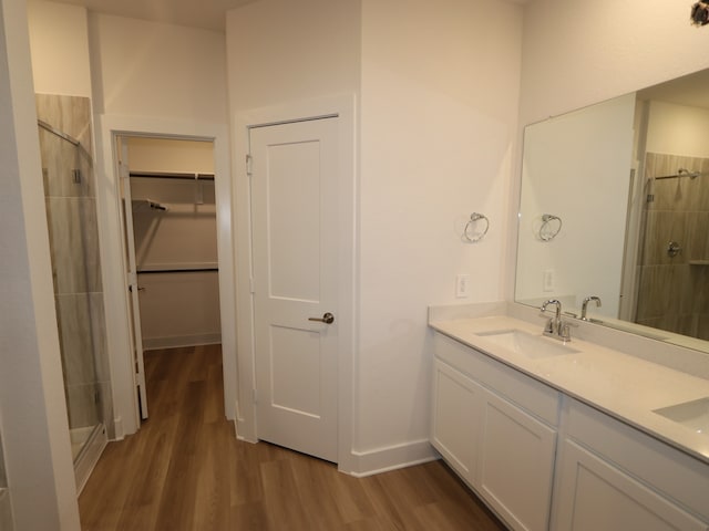 234 Augustine Way, Magnolia, TX 77354 - full bath with wood finished floors, a stall shower, and double vanity