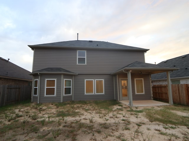 234 Augustine Way, Magnolia, TX 77354 - back of house with a patio and a fenced backyard