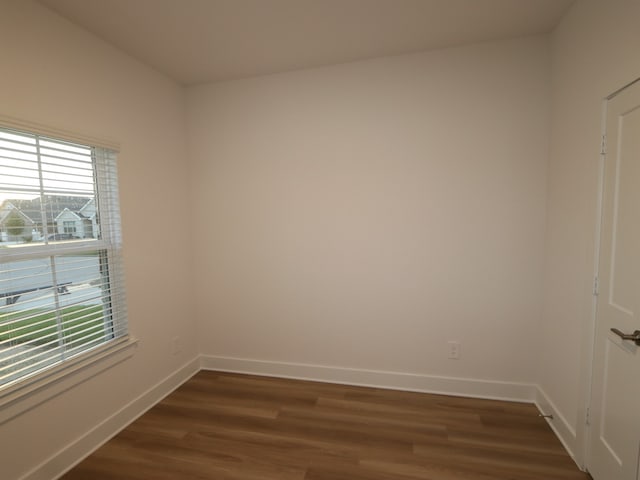 234 Augustine Way, Magnolia, TX 77354 - spare room featuring healthy amount of natural light and dark wood-style flooring