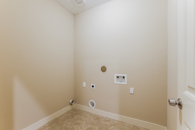 laundry area featuring light colored carpet, hookup for a washing machine, and hookup for an electric dryer