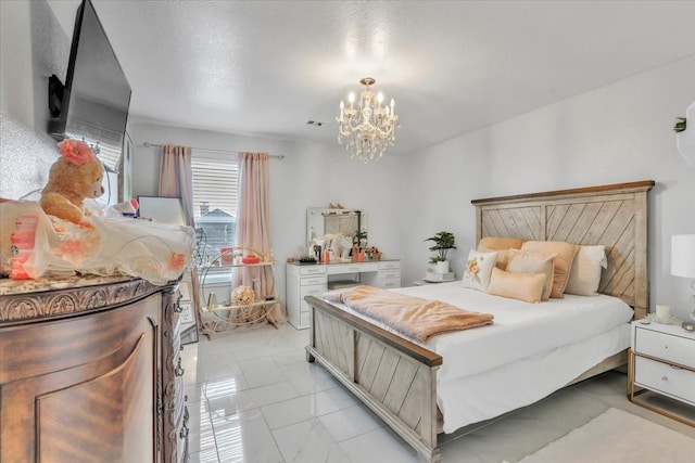 bedroom featuring an inviting chandelier