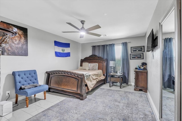 bedroom featuring ceiling fan