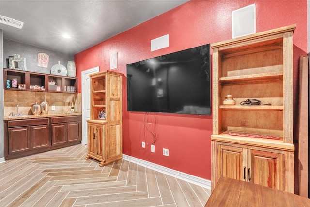 interior space with light parquet floors