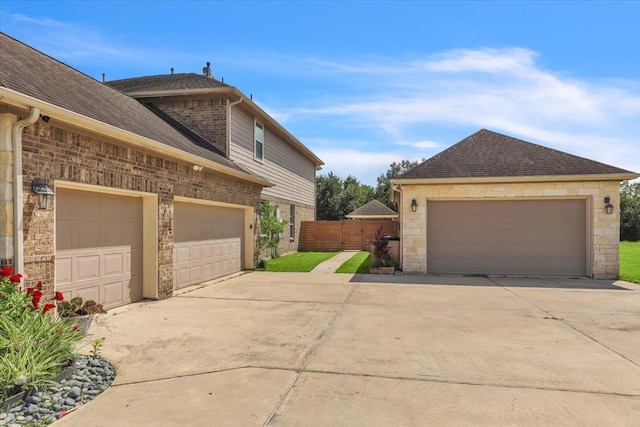 view of property exterior with a garage