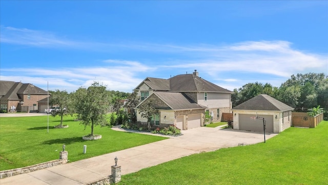 view of front of house with a garage and a front yard