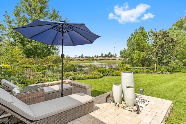 view of patio / terrace with a water view