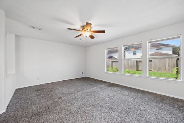 carpeted empty room with ceiling fan