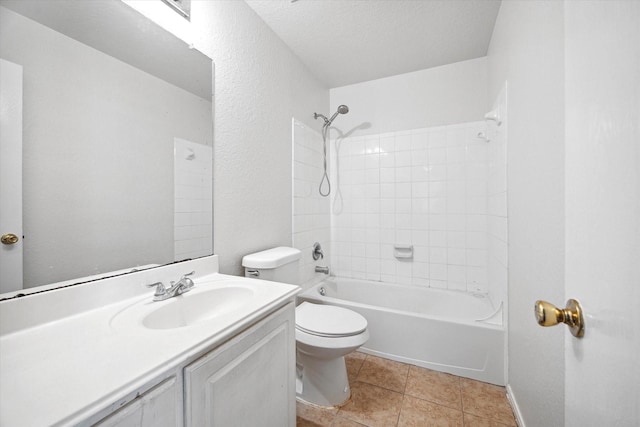 full bathroom featuring shower / bathing tub combination, vanity, tile patterned floors, toilet, and a textured ceiling