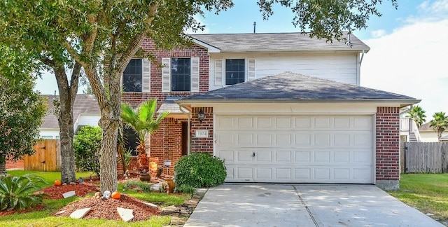 view of property featuring a garage