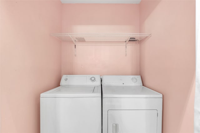 laundry room featuring independent washer and dryer