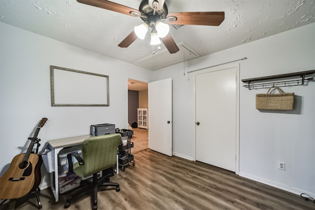 office area featuring wood-type flooring and ceiling fan