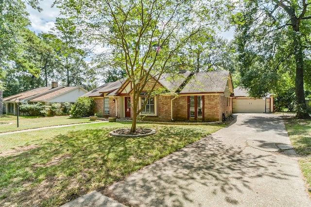 single story home with a garage and a front yard