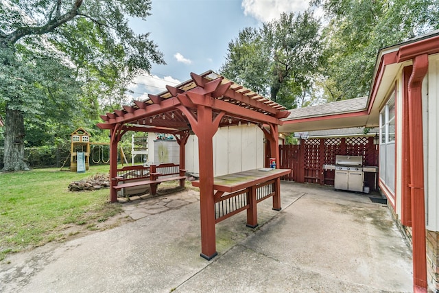 view of patio / terrace with a grill, a playground, and a pergola