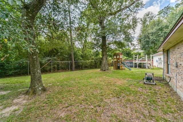 view of yard featuring a playground