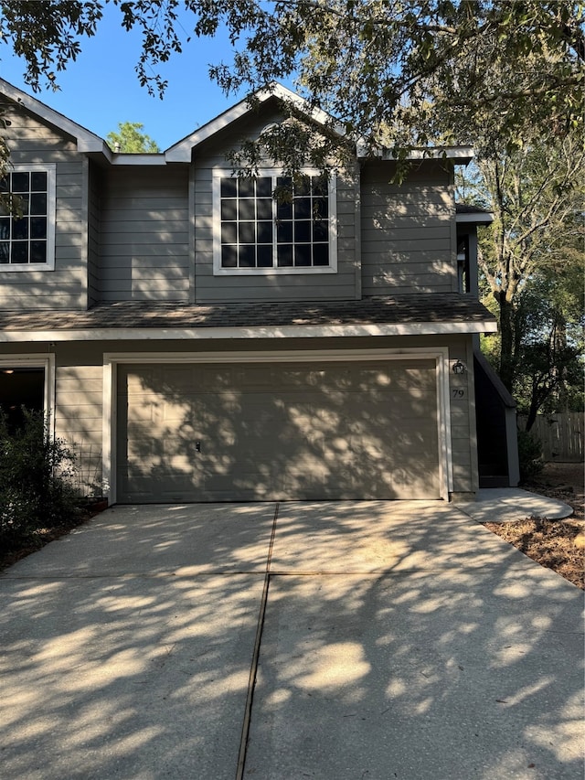 view of front of home with a garage