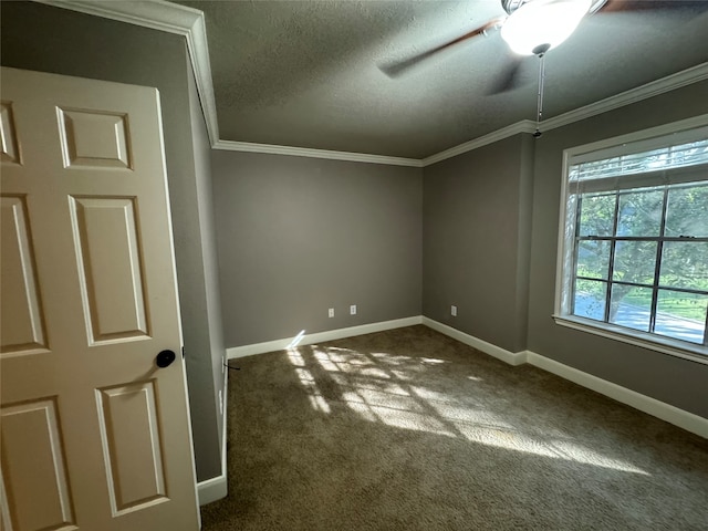 interior space with a textured ceiling, ceiling fan, and ornamental molding