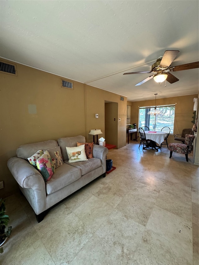 living room featuring ceiling fan