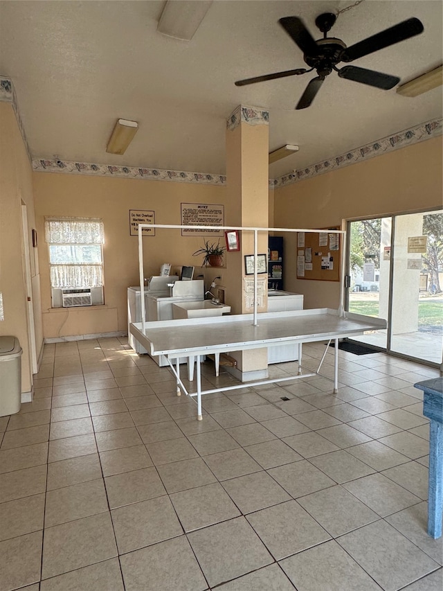 kitchen featuring ceiling fan, light tile patterned flooring, and plenty of natural light