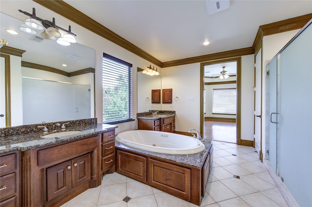 bathroom with tile patterned floors, shower with separate bathtub, crown molding, and vanity