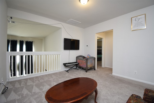 sitting room with light carpet