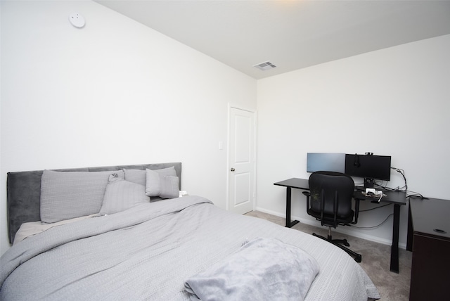 bedroom with light carpet