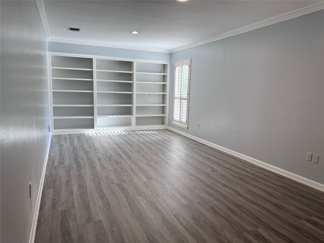 empty room with dark hardwood / wood-style floors and ornamental molding