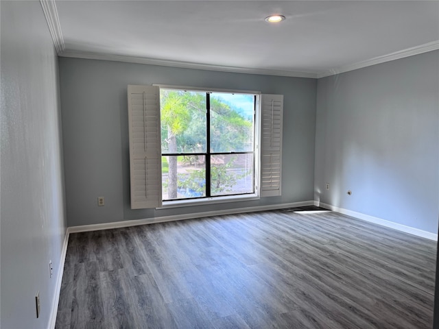 unfurnished room with dark wood-type flooring and ornamental molding