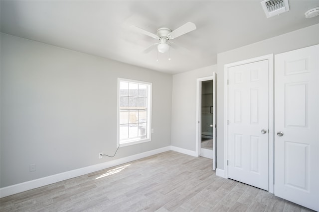 unfurnished bedroom featuring ceiling fan and light hardwood / wood-style flooring