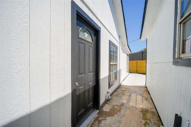 property entrance with a patio