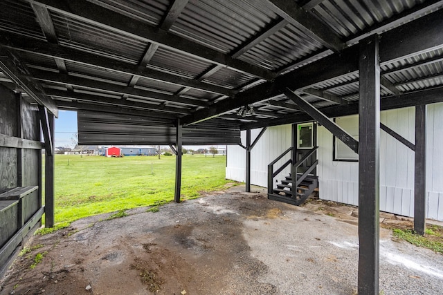 garage featuring a lawn