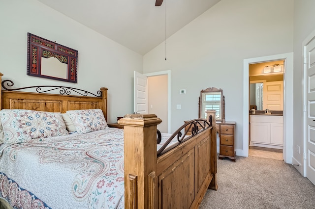 carpeted bedroom with sink, ceiling fan, high vaulted ceiling, and connected bathroom